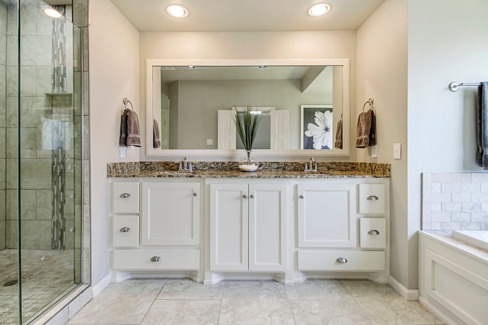 bathroom mirror wider than sink